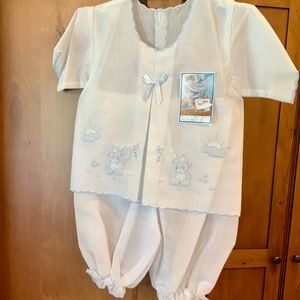 Will Beth 3M embroidered white w/blue
trim infant outfit. Embroidered bear